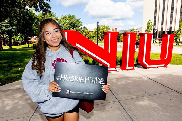 NIU students posing for portraits on the first day of school